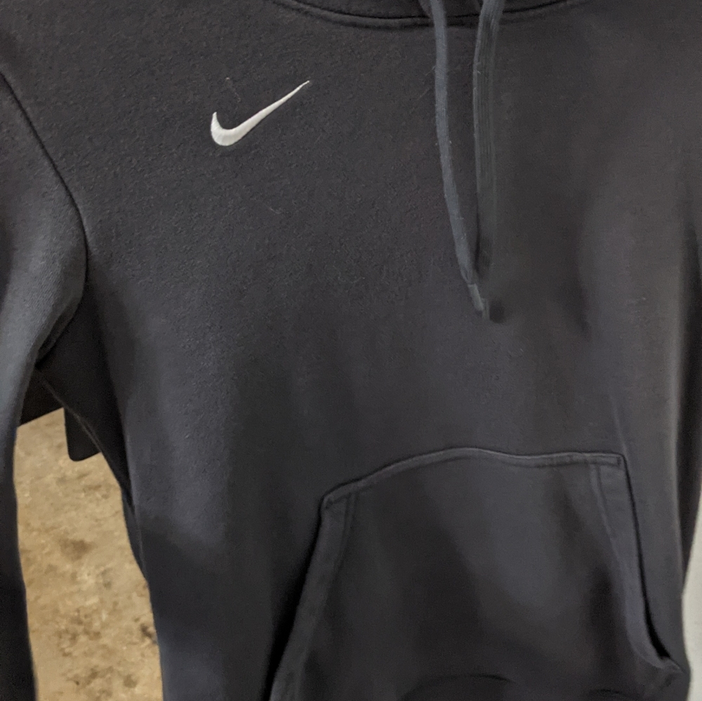 Dark gray Nike pullover sweatshirt with a hood